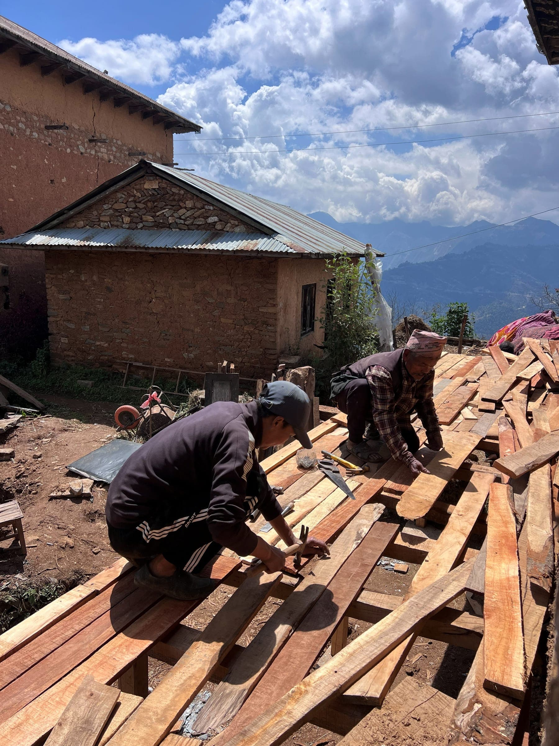 Carpenters working on timber for the new balcony